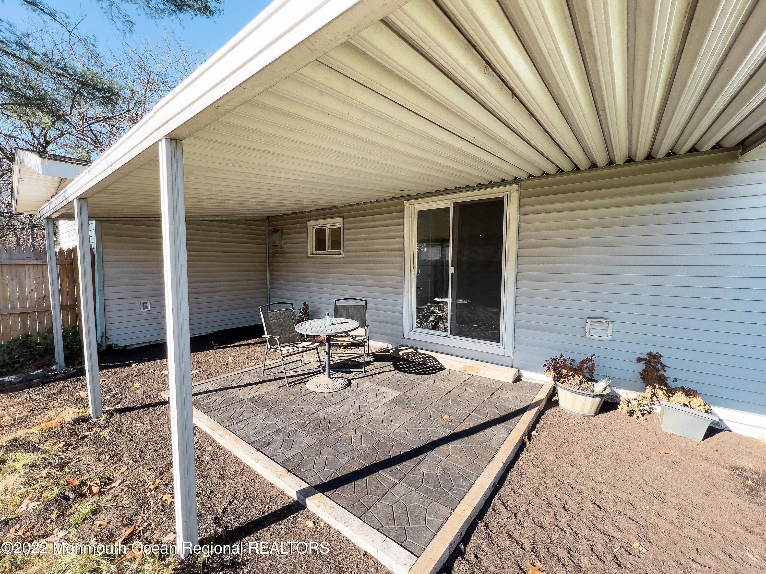 475 Toms River Road Jackson, NJ 08527 - Photo 32 of 49 475 TR Road Covered Patio Side