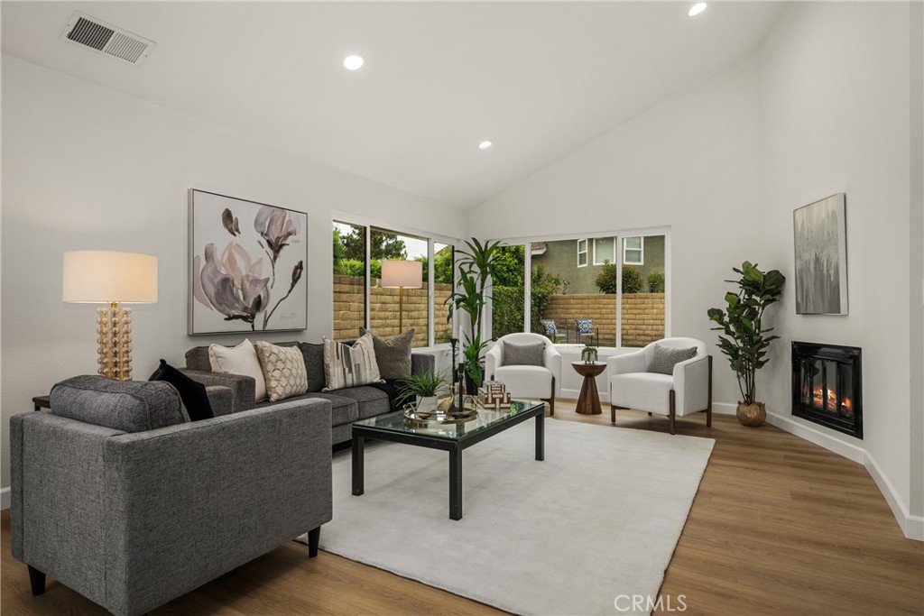 149 Bluegrass Street Brea, CA 92821 - Photo 18 of 60 a living room with furniture and a fireplace