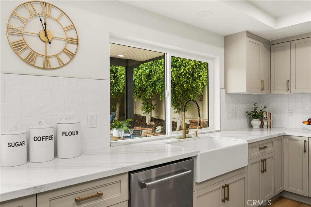 149 Bluegrass Street Brea, CA 92821 - Photo 25 of 60 a kitchen with a sink and a large window
