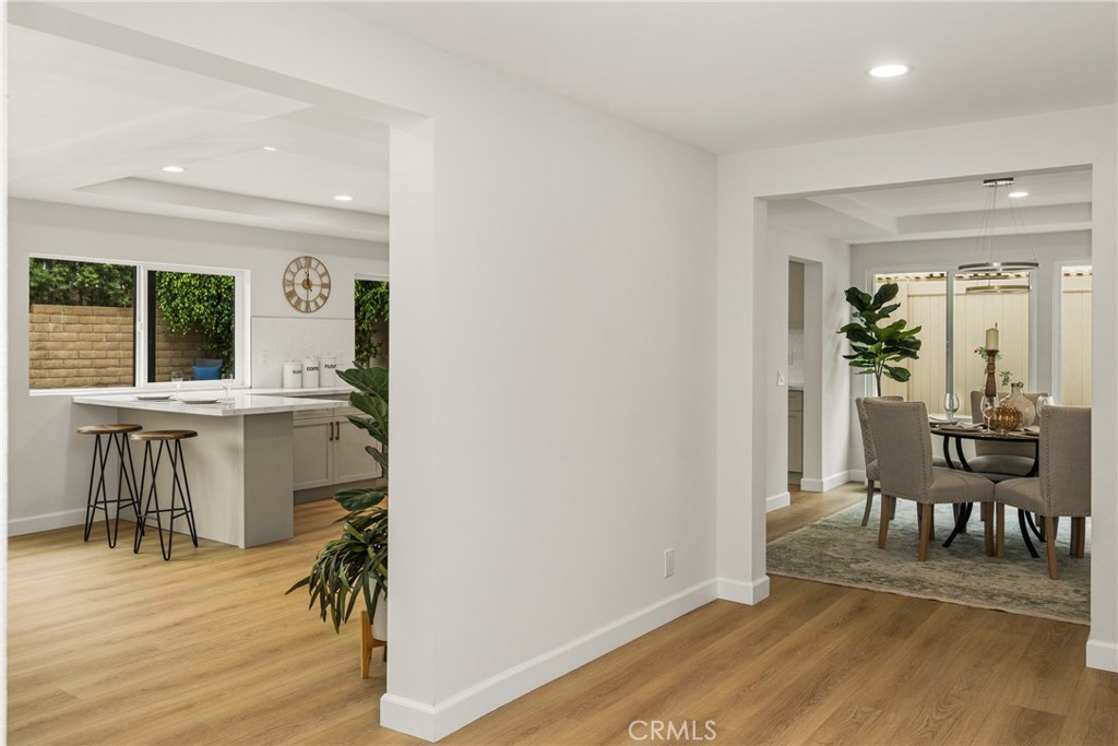 149 Bluegrass Street Brea, CA 92821 - Photo 33 of 60 a view of a dining room with furniture and wooden floor