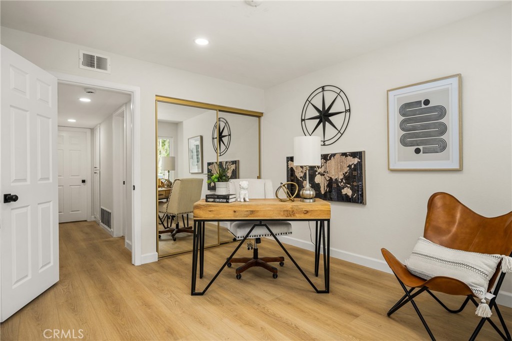 149 Bluegrass Street Brea, CA 92821 - Photo 36 of 60 a view of a livingroom with furniture and wooden floor