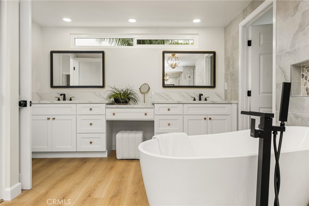 149 Bluegrass Street Brea, CA 92821 - Photo 45 of 60 a spacious bathroom with a double vanity sink mirror and bathtub