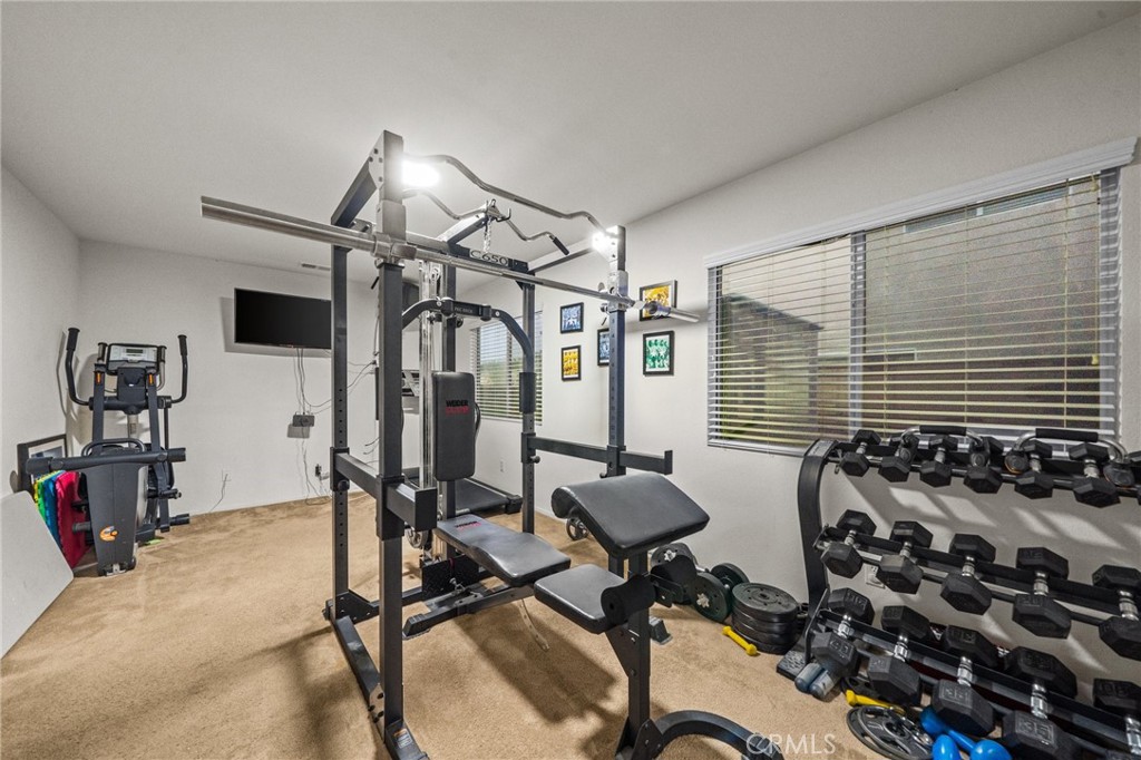 809 Classic Avenue Beaumont, CA 92223 - Photo 15 of 41 a view of a room with gym equipment