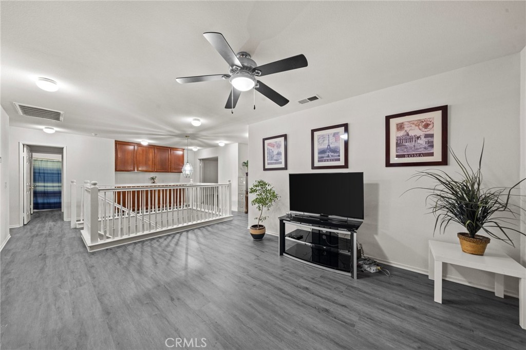 809 Classic Avenue Beaumont, CA 92223 - Photo 24 of 41 a view of livingroom with hardwood floor and window