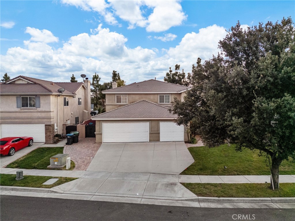 809 Classic Avenue Beaumont, CA 92223 - Photo 3 of 41 front view of a house with a yard