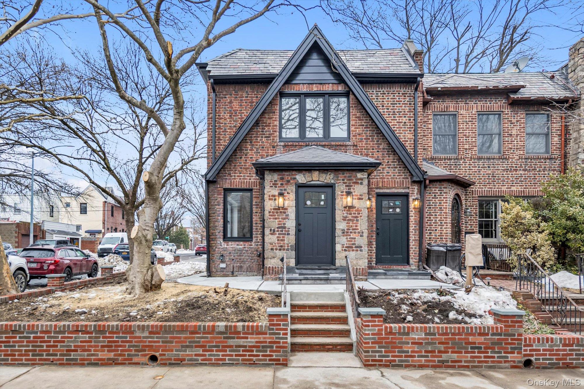 85-45 67th Road Queens, NY 11374 - Photo 1 of 28 a front view of a building with trees
