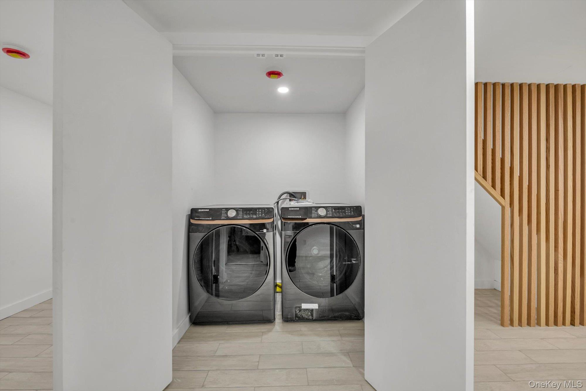 85-45 67th Road Queens, NY 11374 - Photo 13 of 28 a utility room with dryer and washer