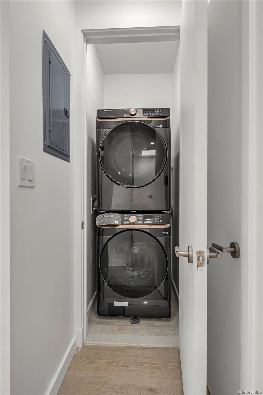 85-45 67th Road Queens, NY 11374 - Photo 22 of 28 a utility room with washing machine