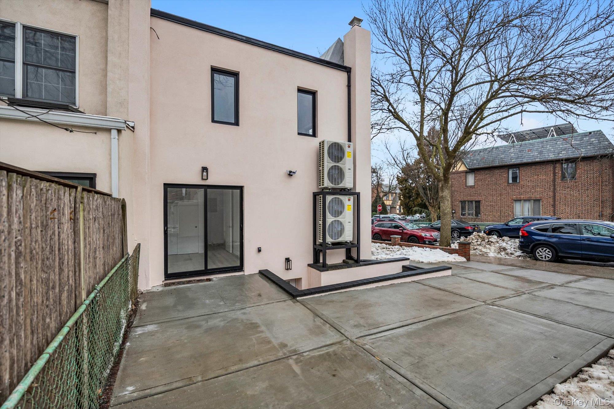 85-45 67th Road Queens, NY 11374 - Photo 23 of 28 a view of a car park in front of house