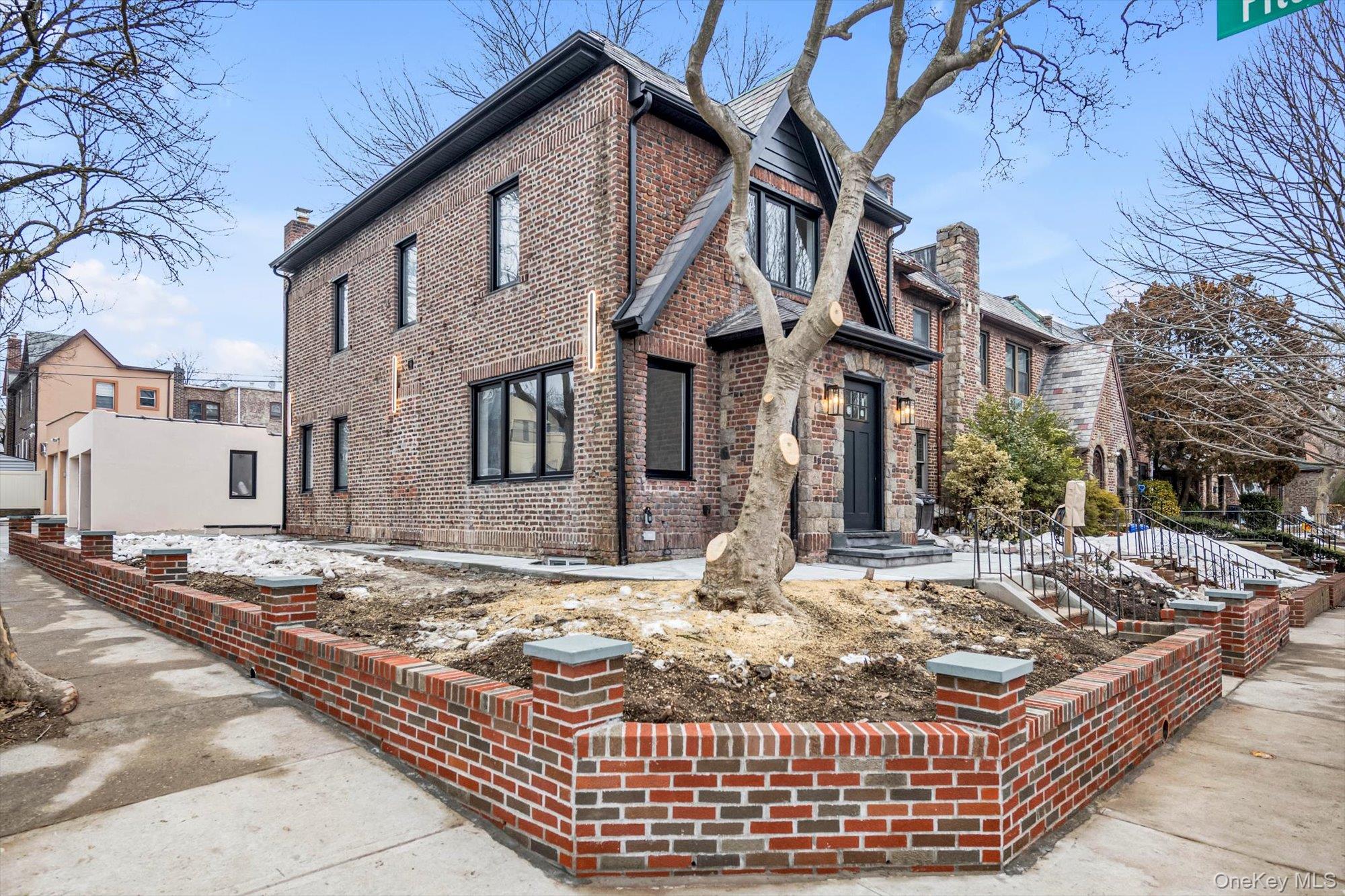 85-45 67th Road Queens, NY 11374 - Photo 28 of 28 a view of a building with a yard