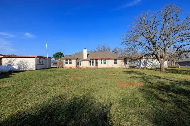 a house view with garden space