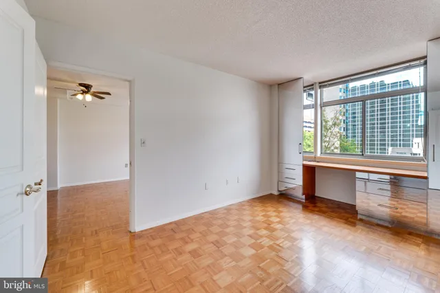 an empty room with windows