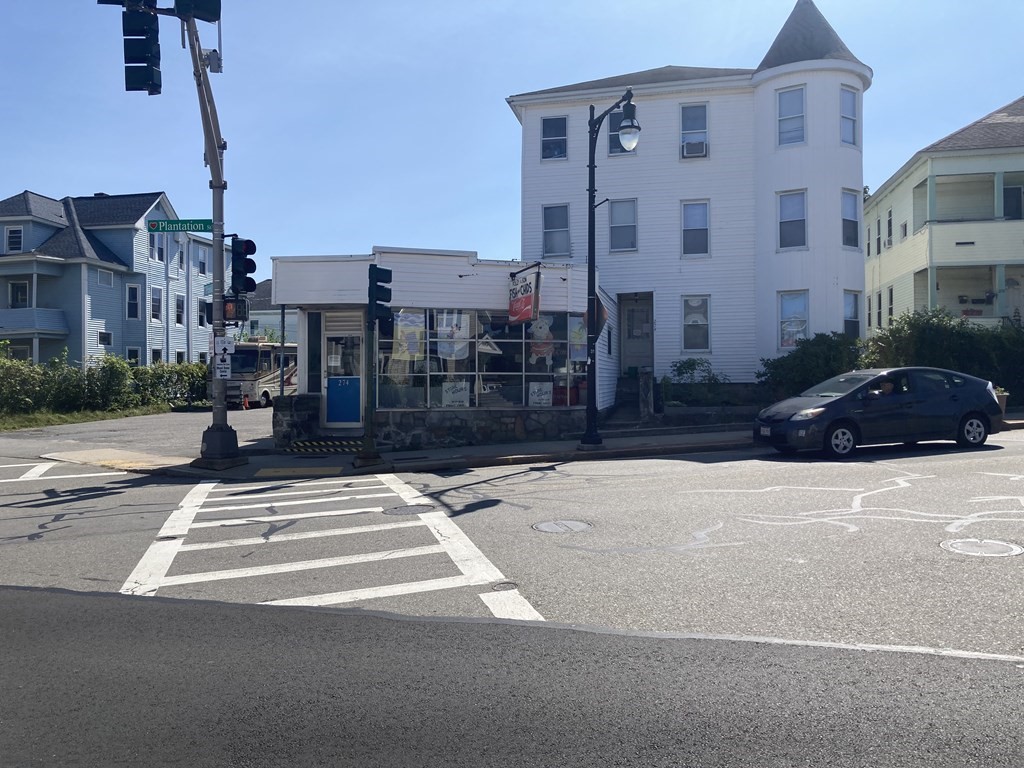 a street view with tall buildings