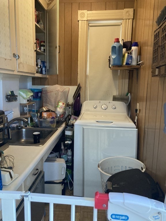 274 Plantation Street Worcester, MA 01604 - Photo 19 of 27 a utility room with dryer and washer