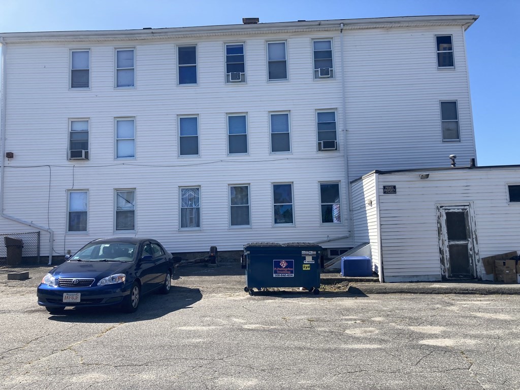 274 Plantation Street Worcester, MA 01604 - Photo 2 of 27 a car parked in front of a building