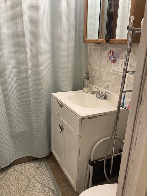 274 Plantation Street Worcester, MA 01604 - Photo 21 of 27 a utility room with dryer and washer