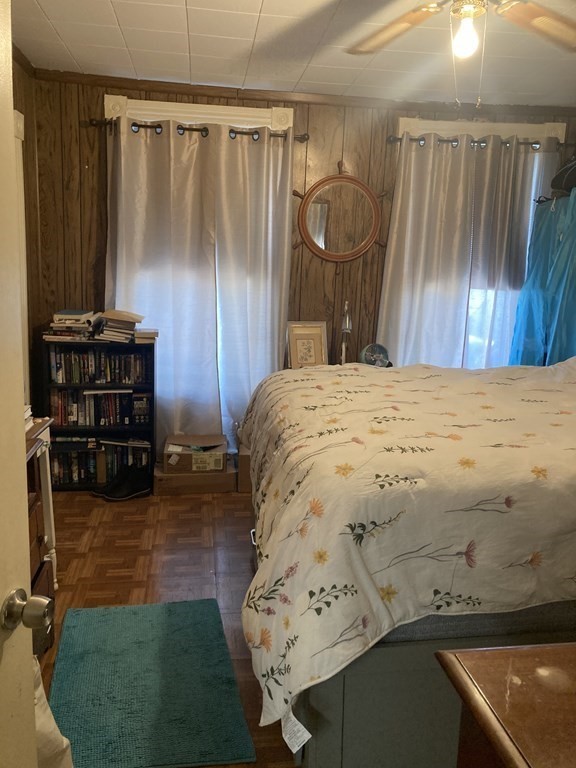 274 Plantation Street Worcester, MA 01604 - Photo 9 of 27 a bed sitting in a room next to a window