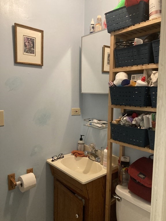 274 Plantation Street Worcester, MA 01604 - Photo 10 of 27 a bathroom with a sink toilet and mirror