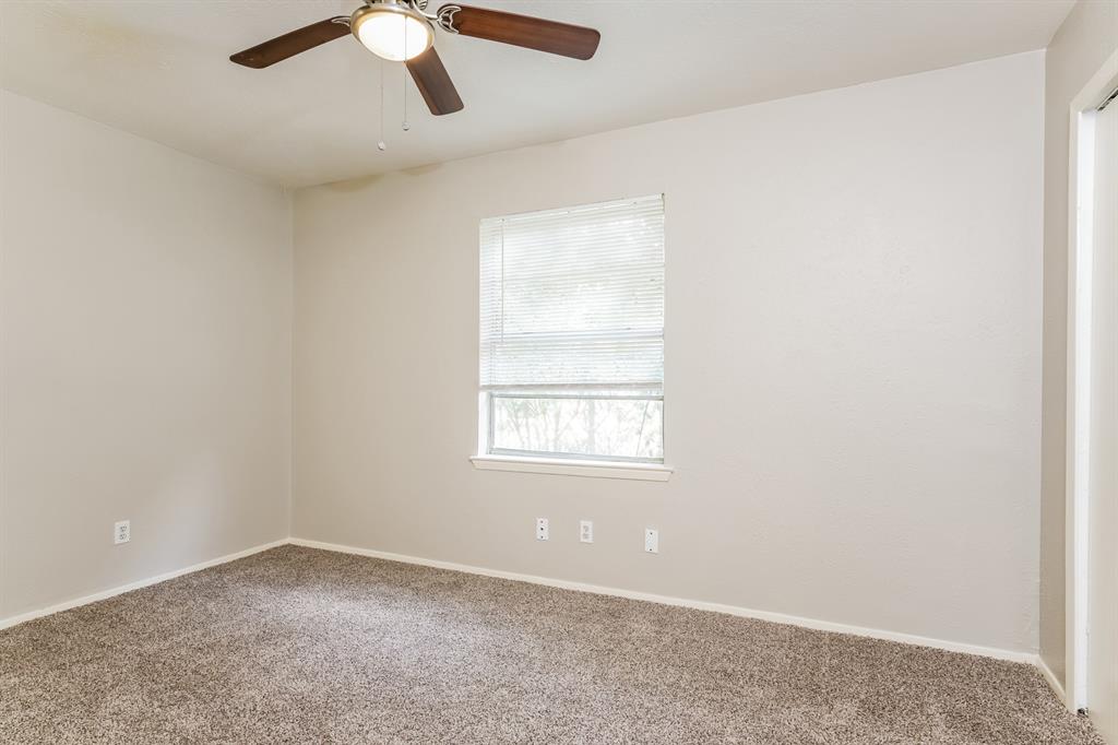 6530 Gentle River Drive Dallas, TX 75241 - Photo 8 of 15 an empty room with a window