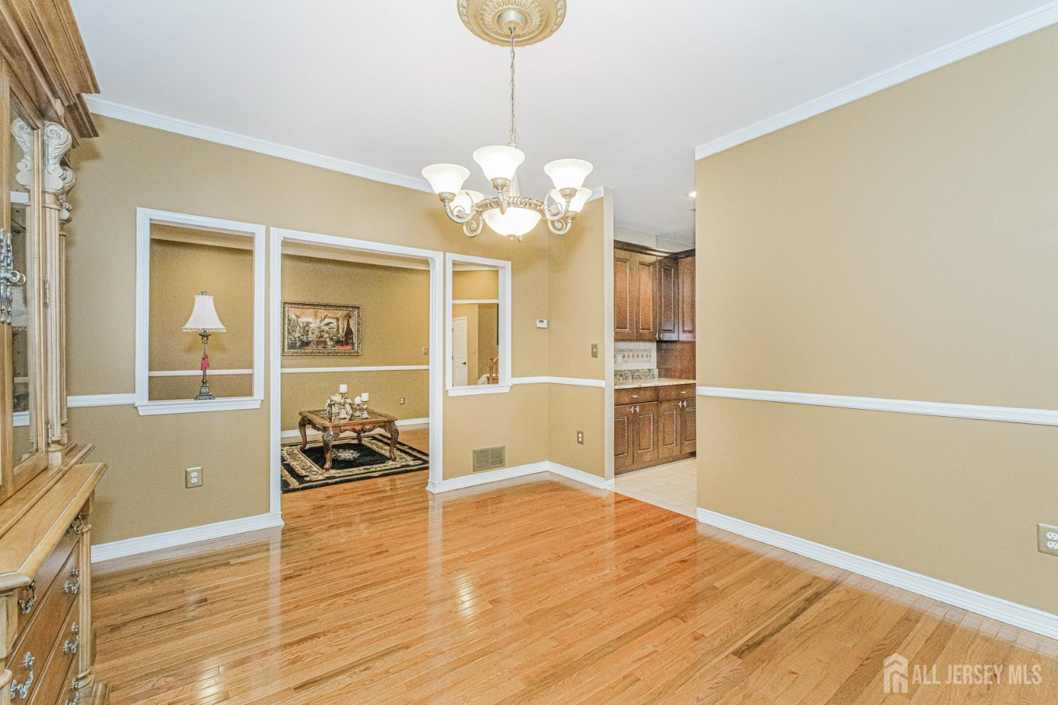 19 Helene Street Old Bridge, NJ 08857 - Photo 11 of 46 a view of a livingroom with wooden floor