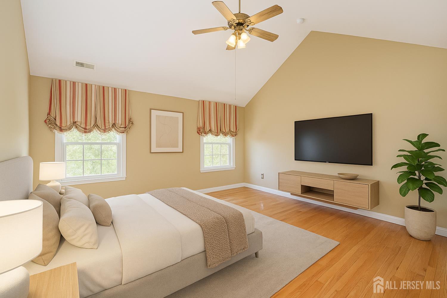 19 Helene Street Old Bridge, NJ 08857 - Photo 24 of 46 a bedroom with a bed and a flat screen tv