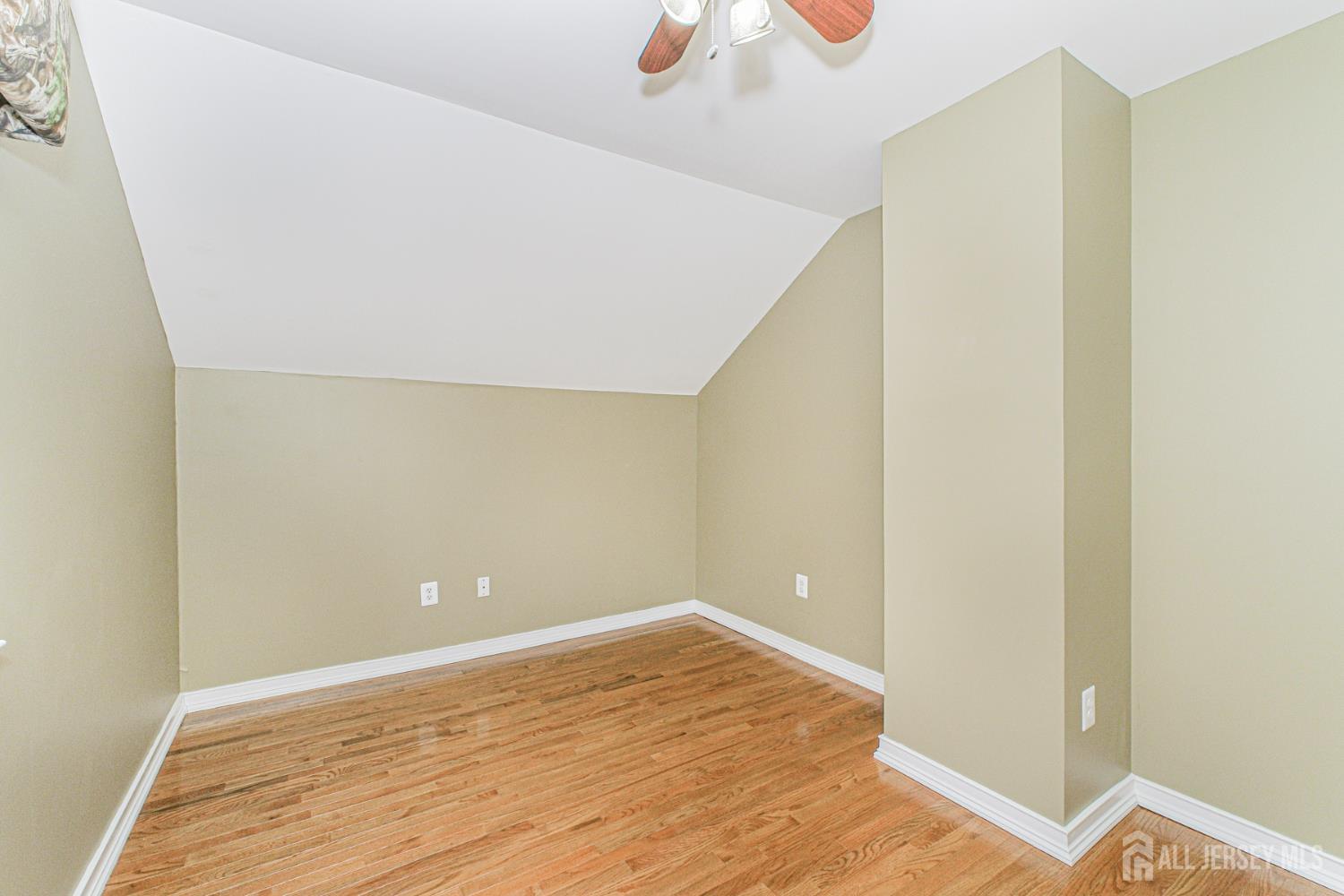19 Helene Street Old Bridge, NJ 08857 - Photo 34 of 46 a view of empty room with wooden floor
