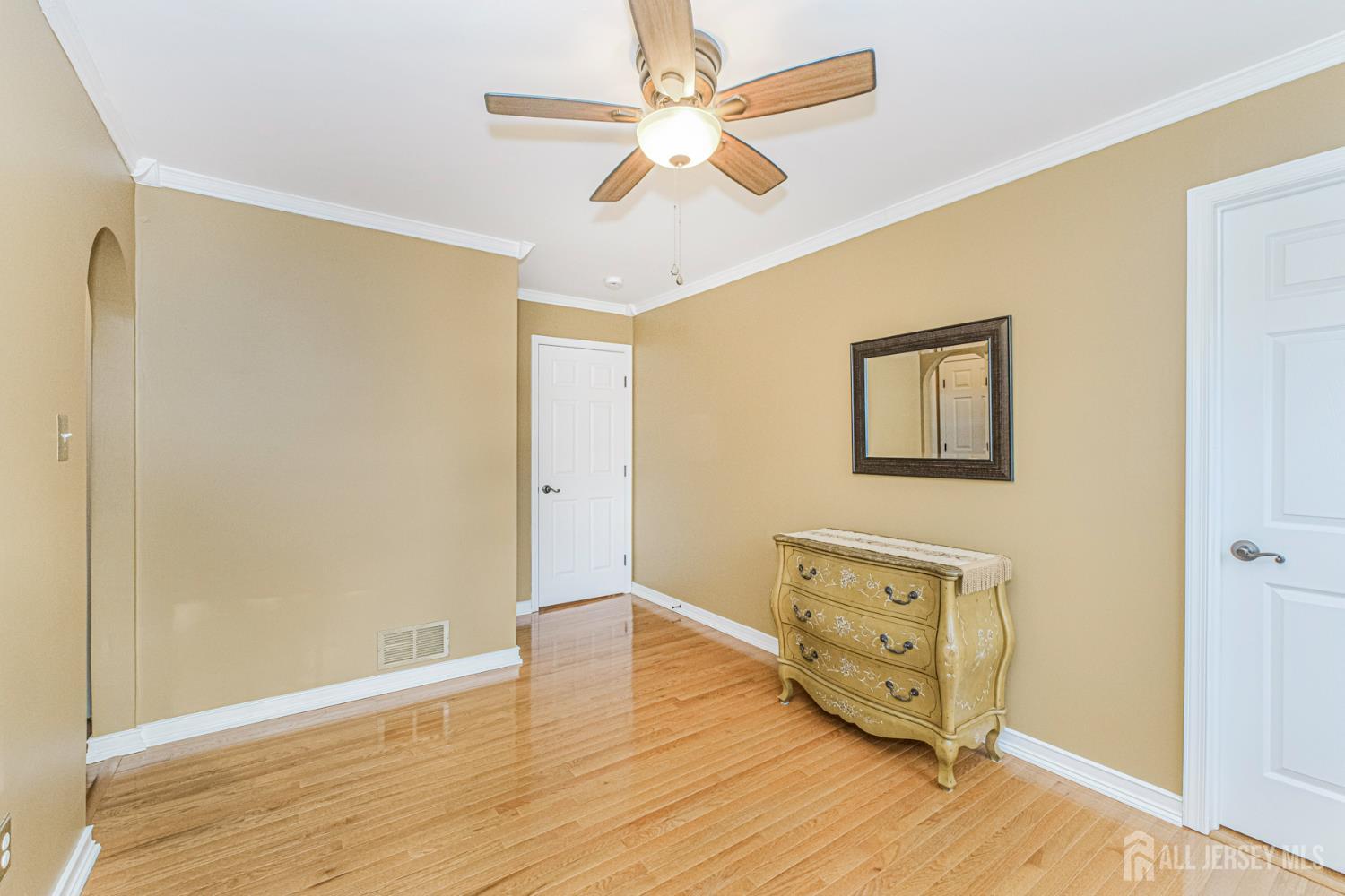 19 Helene Street Old Bridge, NJ 08857 - Photo 36 of 46 a view of an empty room with wooden floor