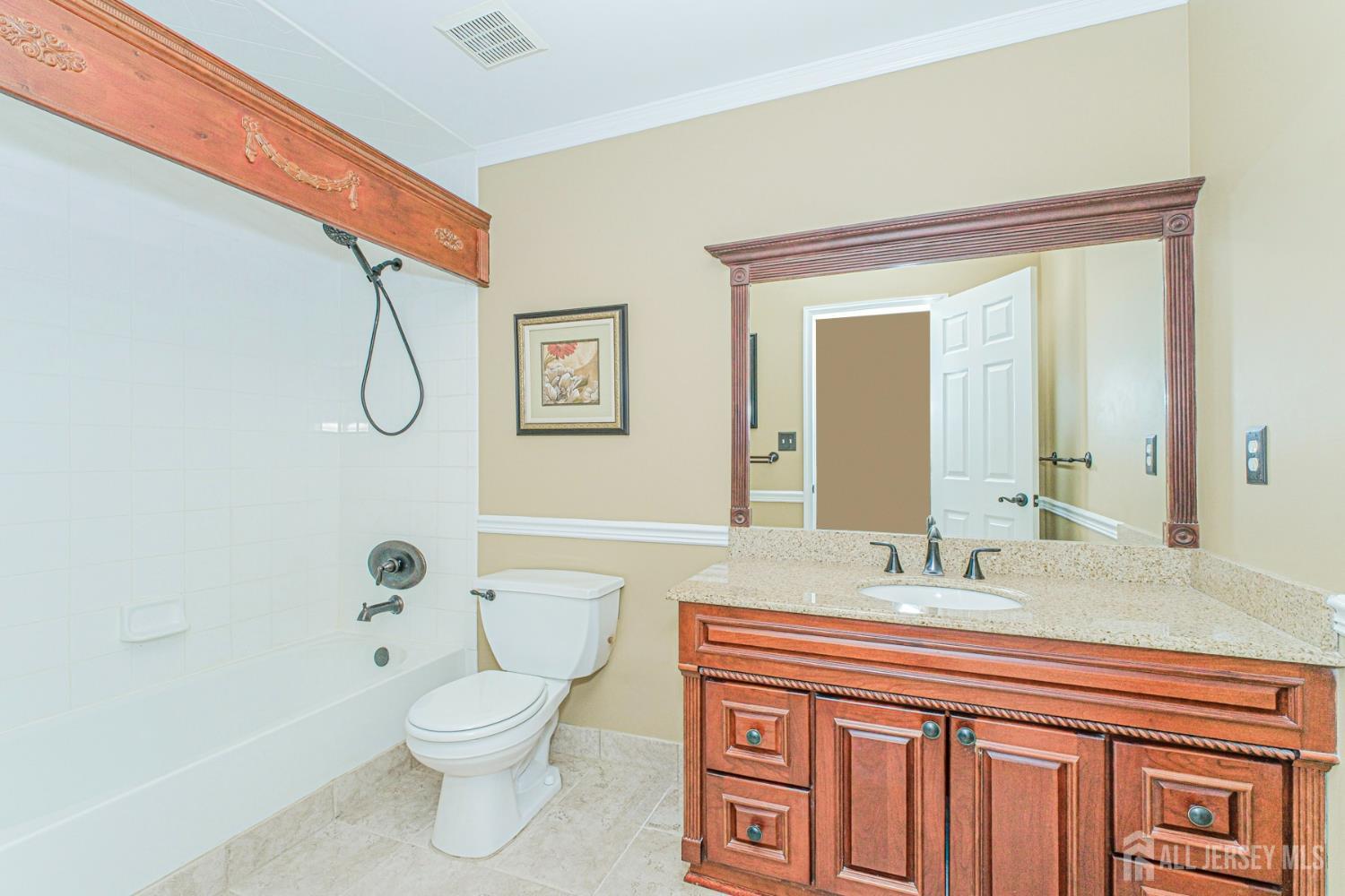 19 Helene Street Old Bridge, NJ 08857 - Photo 39 of 46 a bathroom with a granite countertop sink toilet a mirror and shower