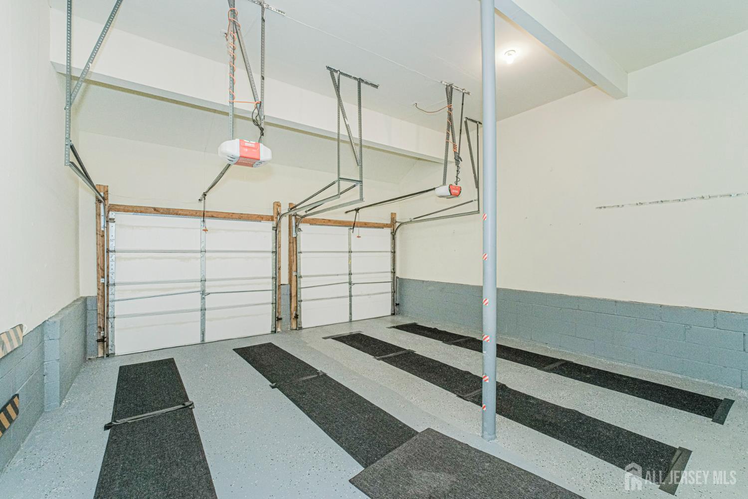 19 Helene Street Old Bridge, NJ 08857 - Photo 42 of 46 a view of a room with racks on the wall