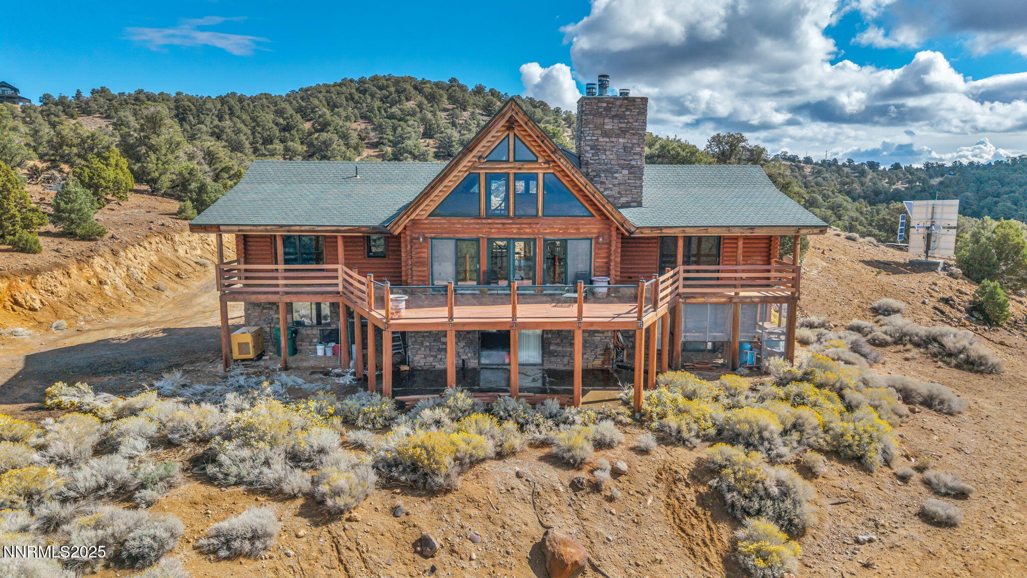 1300 Yellow Jacket Road Reno, NV 89521 - Photo 56 of 65 front view of a house with a yard