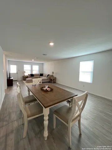 a view of a dining room with furniture