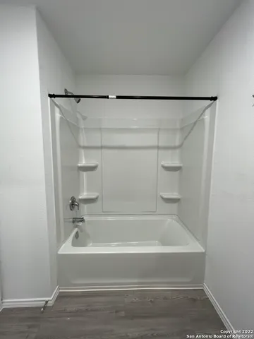 a bathroom with a bathtub