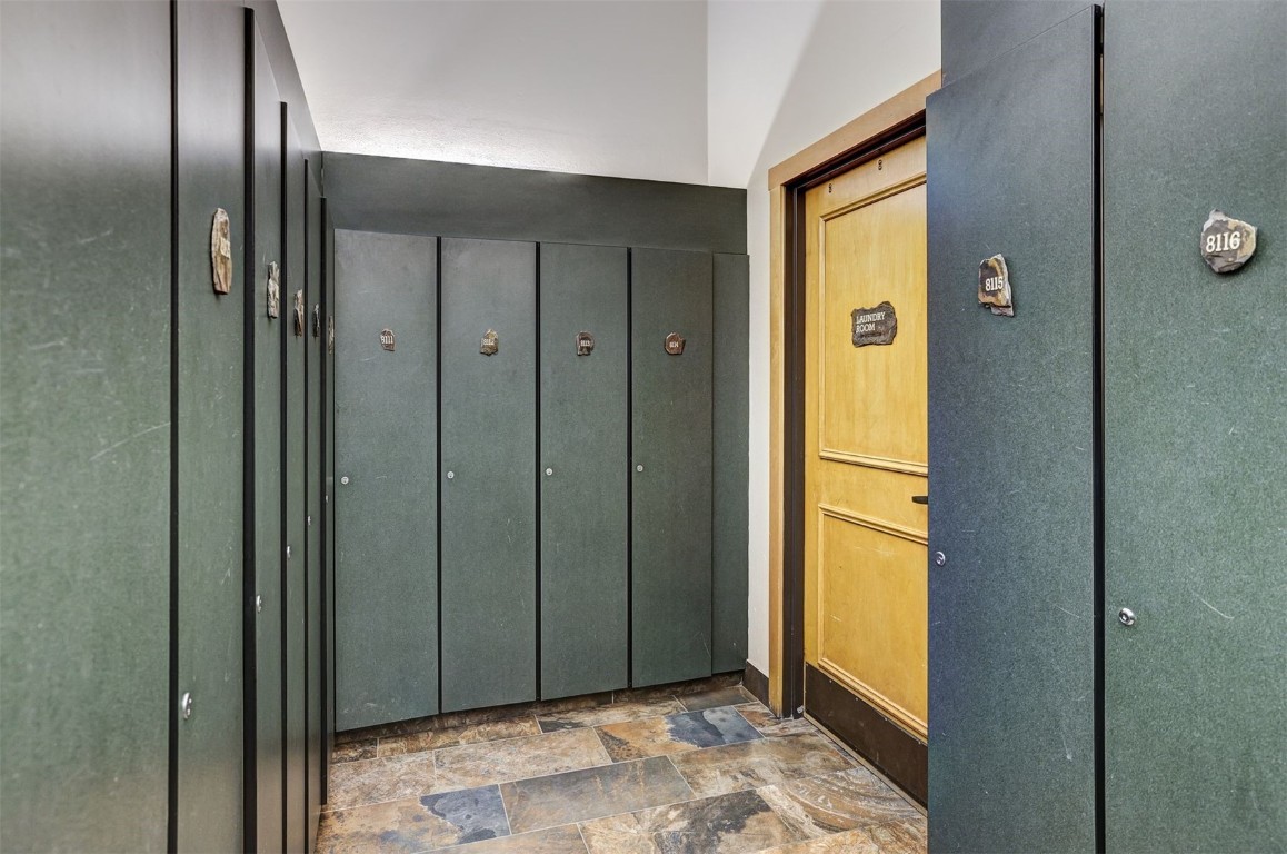 91 River Run Road, Unit 8137 Keystone, CO 80435 - Photo 22 of 37 a view of a elevator and hallway with bathroom