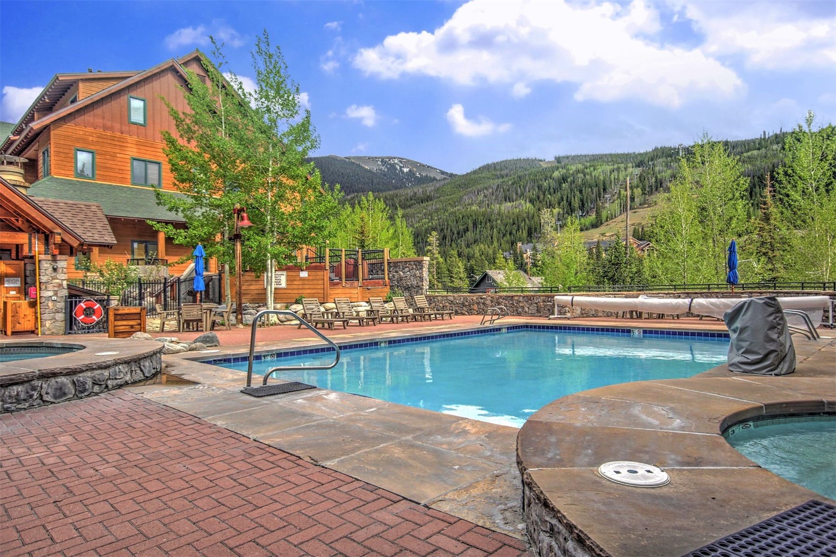 91 River Run Road, Unit 8137 Keystone, CO 80435 - Photo 23 of 37 a view of a swimming pool with a patio