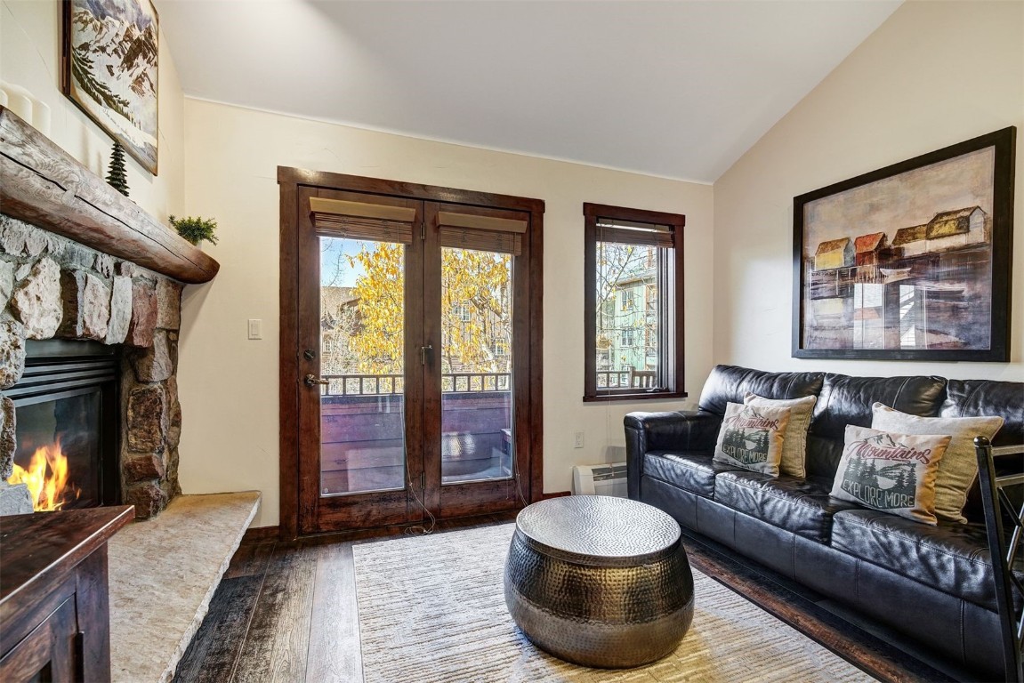 91 River Run Road, Unit 8137 Keystone, CO 80435 - Photo 9 of 37 a living room with furniture and a fireplace