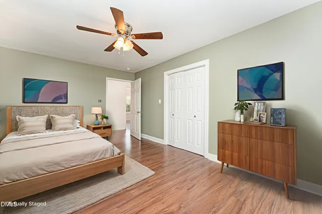 a view of a house with a yard and garage