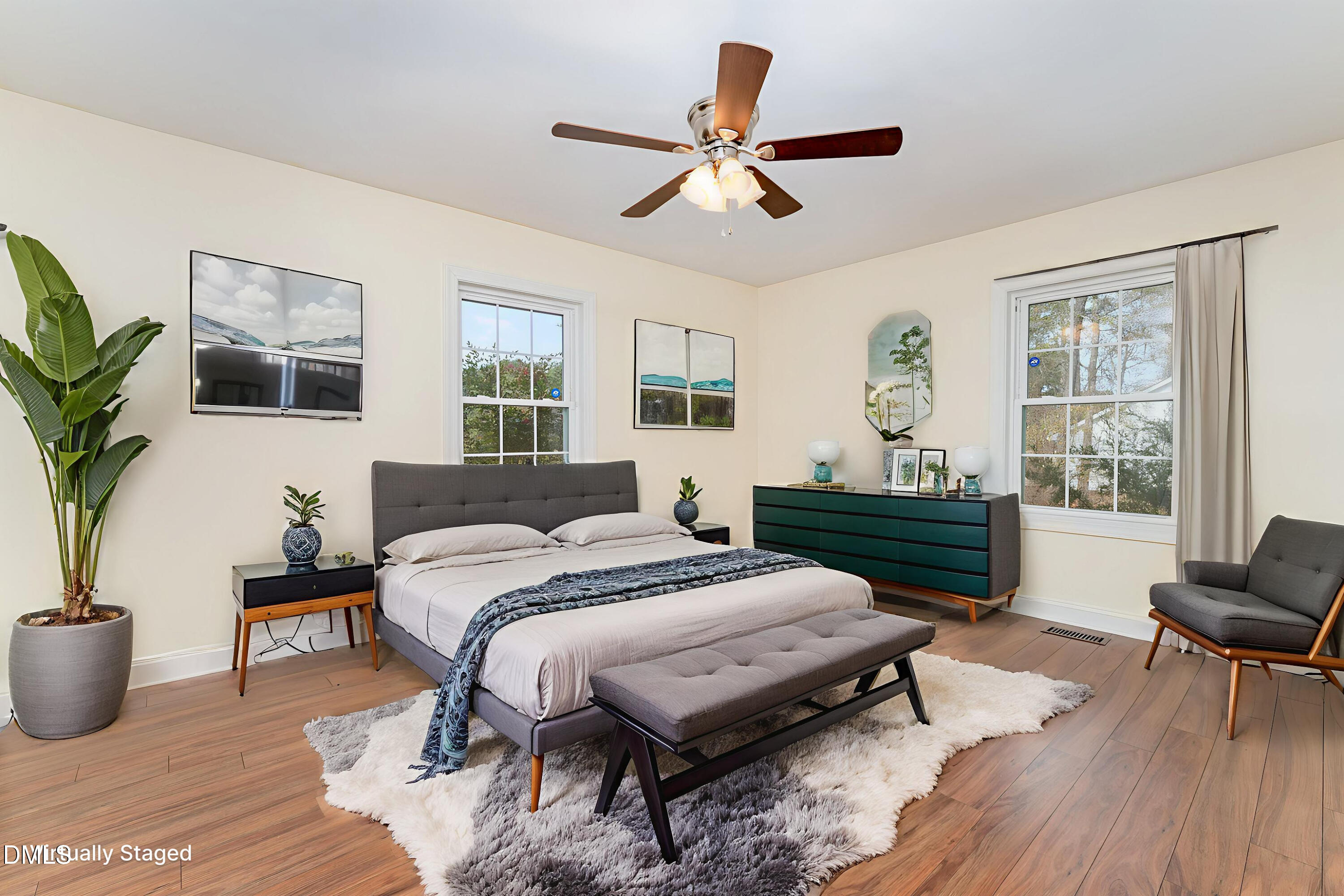 4159 Princeton Kenly Road Kenly, NC 27542 - Photo 25 of 37 a bed room with a bed and a chair