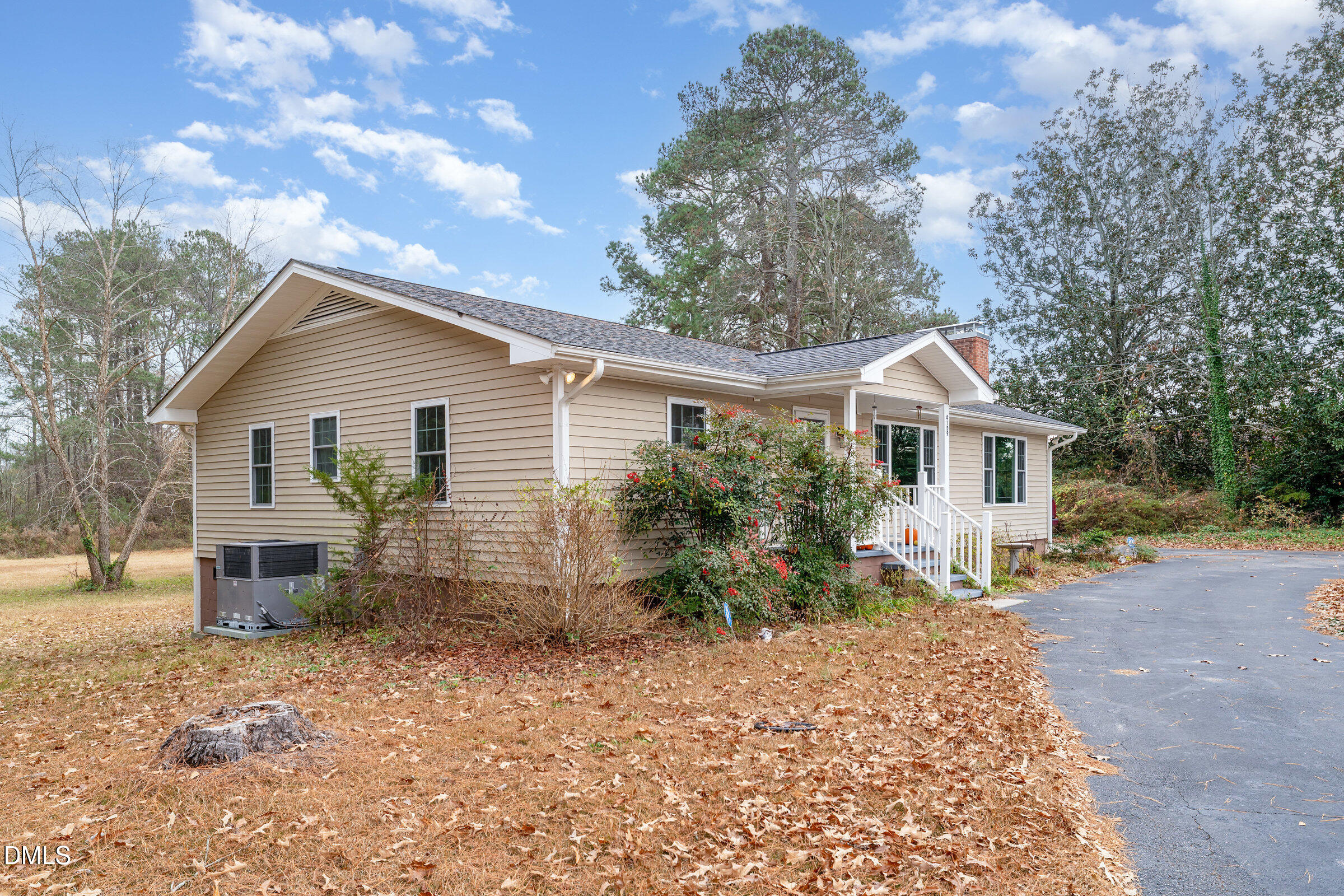 4159 Princeton Kenly Road Kenly, NC 27542 - Photo 2 of 37 a front view of a house with garden