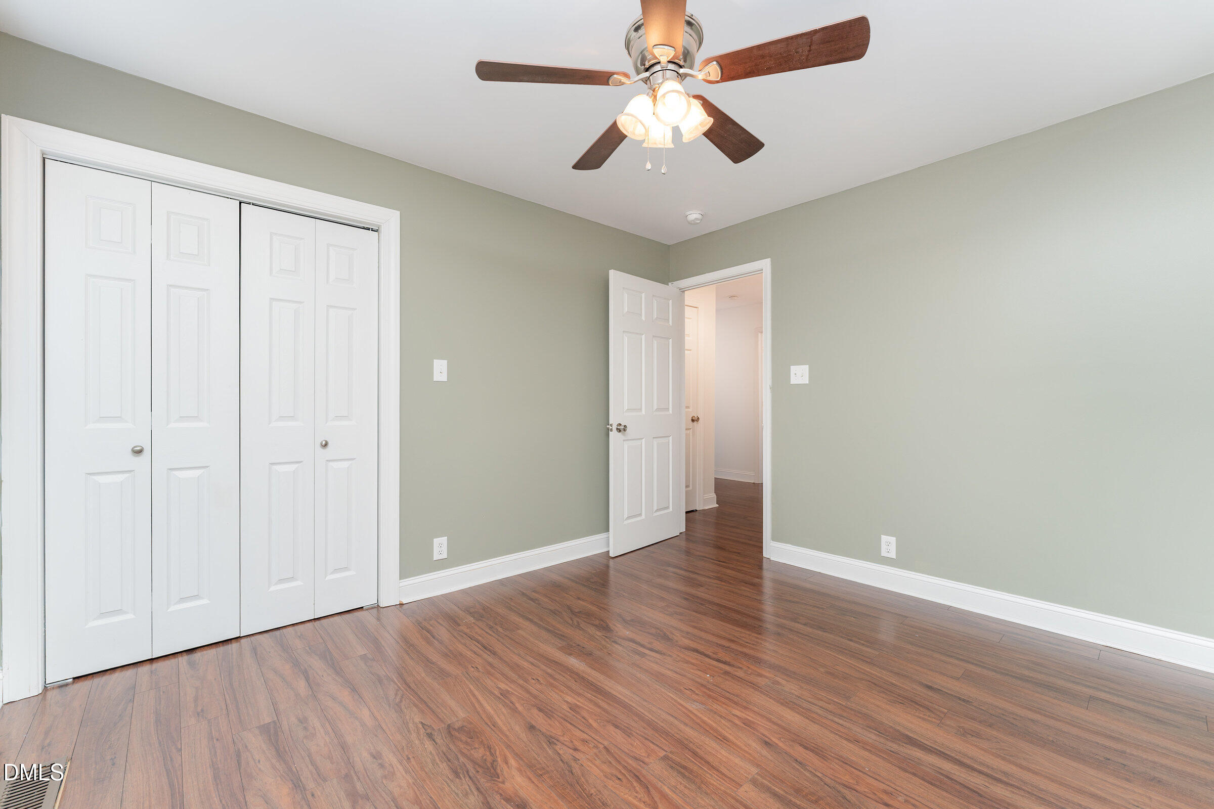 4159 Princeton Kenly Road Kenly, NC 27542 - Photo 30 of 37 wooden floor in an empty room with a window