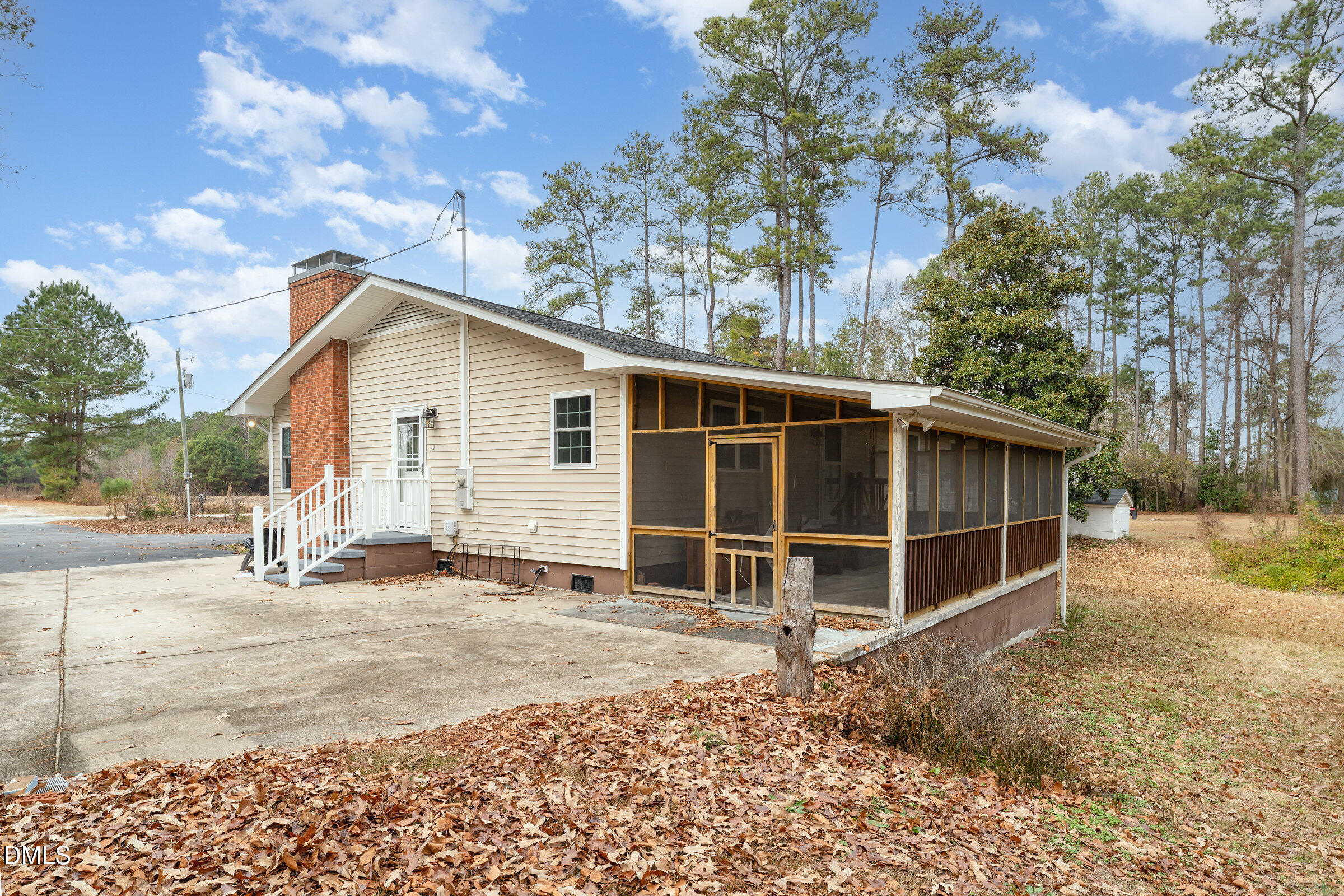 4159 Princeton Kenly Road Kenly, NC 27542 - Photo 33 of 37 a view of a house with a yard and wooden fence