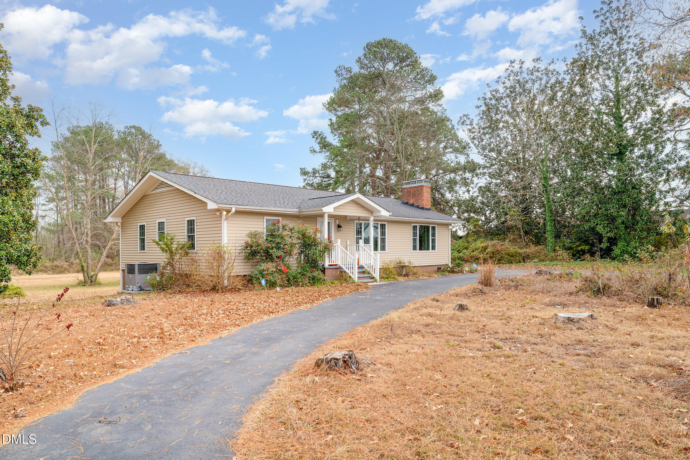 4159 Princeton Kenly Road Kenly, NC 27542 - Photo 6 of 37 a front view of a house with a yard