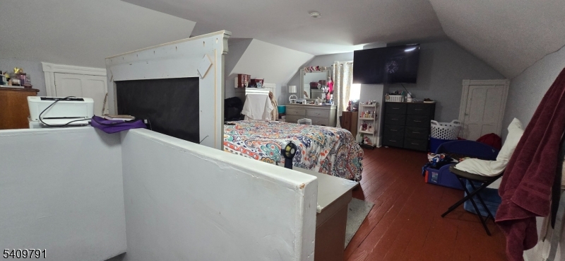 597 Belvidere Road, Unit 2 Phillipsburg, NJ 08865 - Photo 15 of 15 a living room with furniture and a flat screen tv