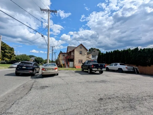 a view of a big yard next to a house