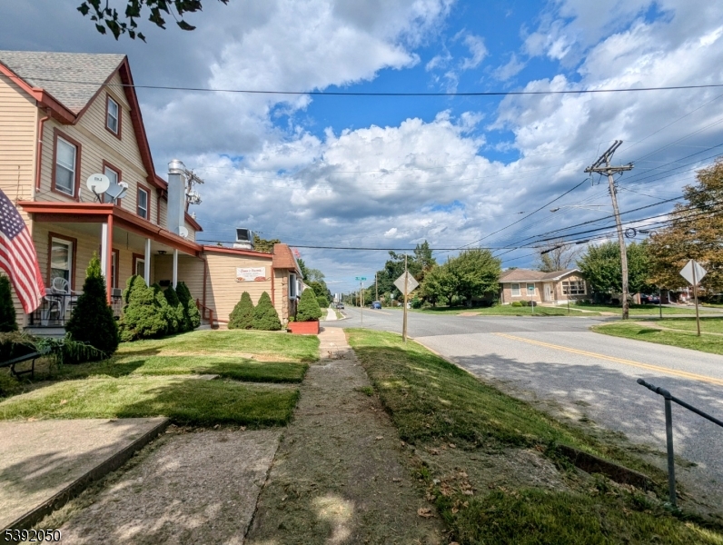 597 Belvidere Road, Unit 2 Phillipsburg, NJ 08865 - Photo 6 of 15 a view of a big yard next to a house