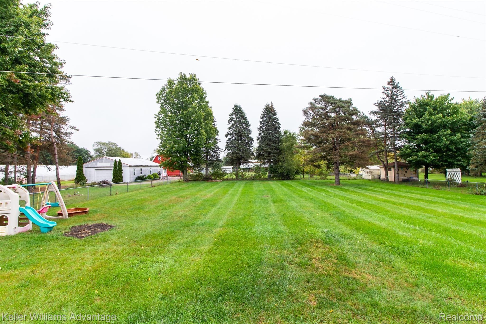 8302 North McKinley Road Flushing, MI 48433 - Photo 29 of 33 NMcKinleyRd_8302_Back_02.jpg