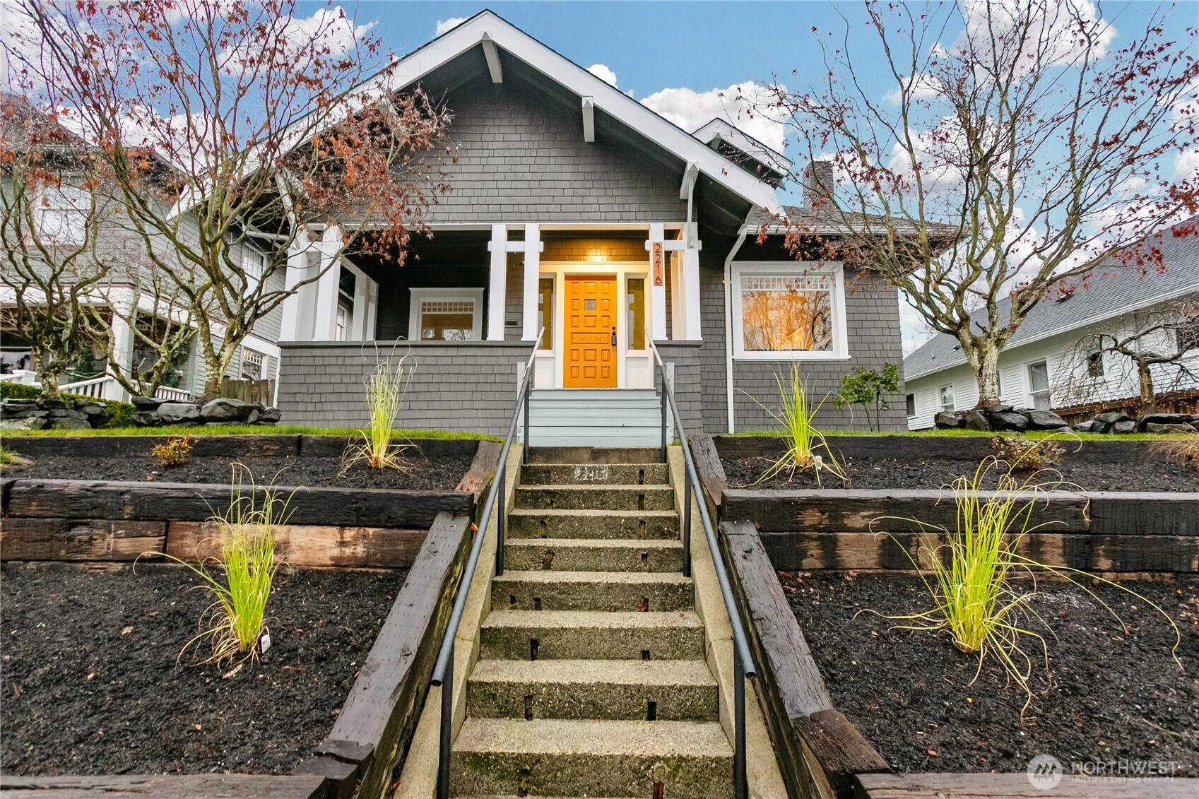 a front view of a house with a yard