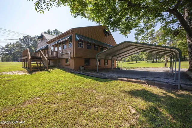 a view of a house with a swimming pool