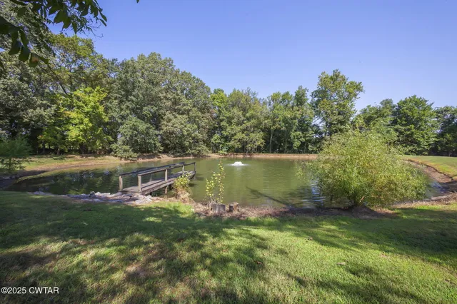 a view of a house with a lake view