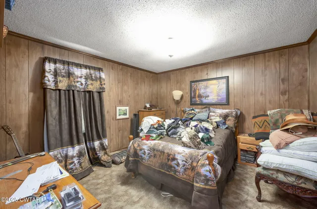 a bedroom with bed or furniture and a window