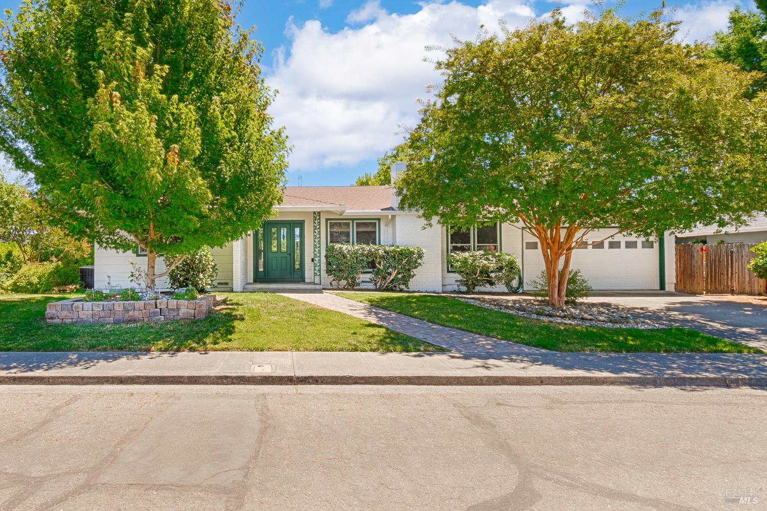 351 Mockingbird Circle Santa Rosa, CA 95409 - Photo 1 of 1 a front view of a house with a yard